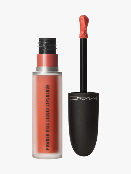 MAC Powder Kiss Liquid Lipcolour in Sorry Not Sorry tube of reddish orange liquid lipstick with black cap and wand to the side on light gray background